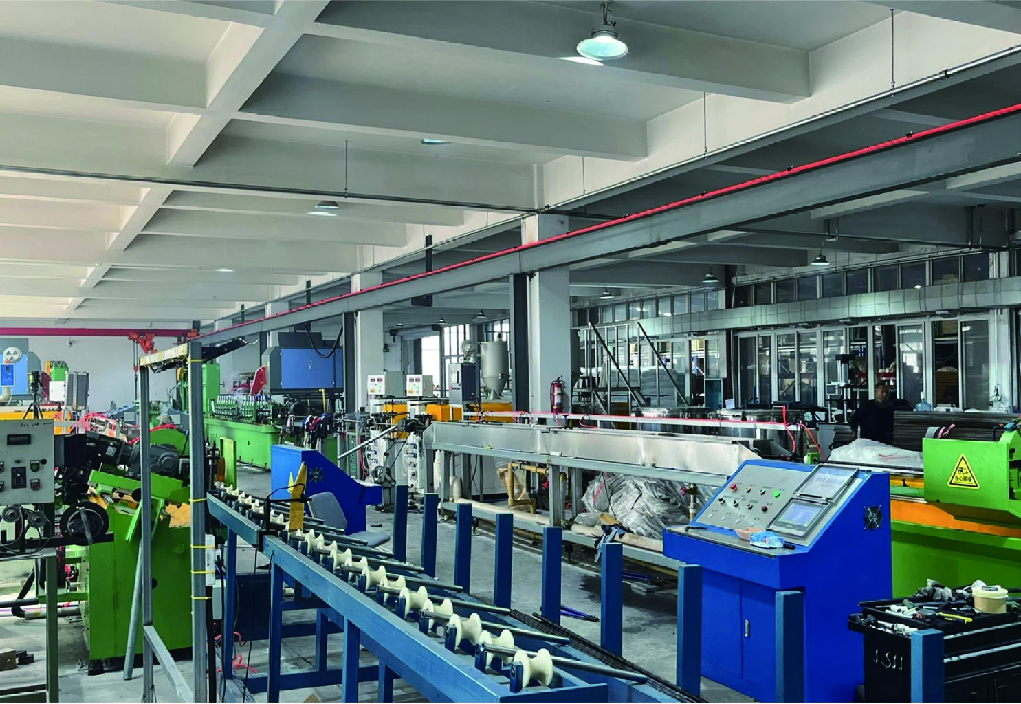 YzzGarden production line with processing equipment and material rollers