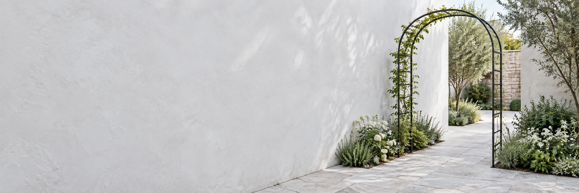 Illustrative garden arch in a quiet contemporary courtyard