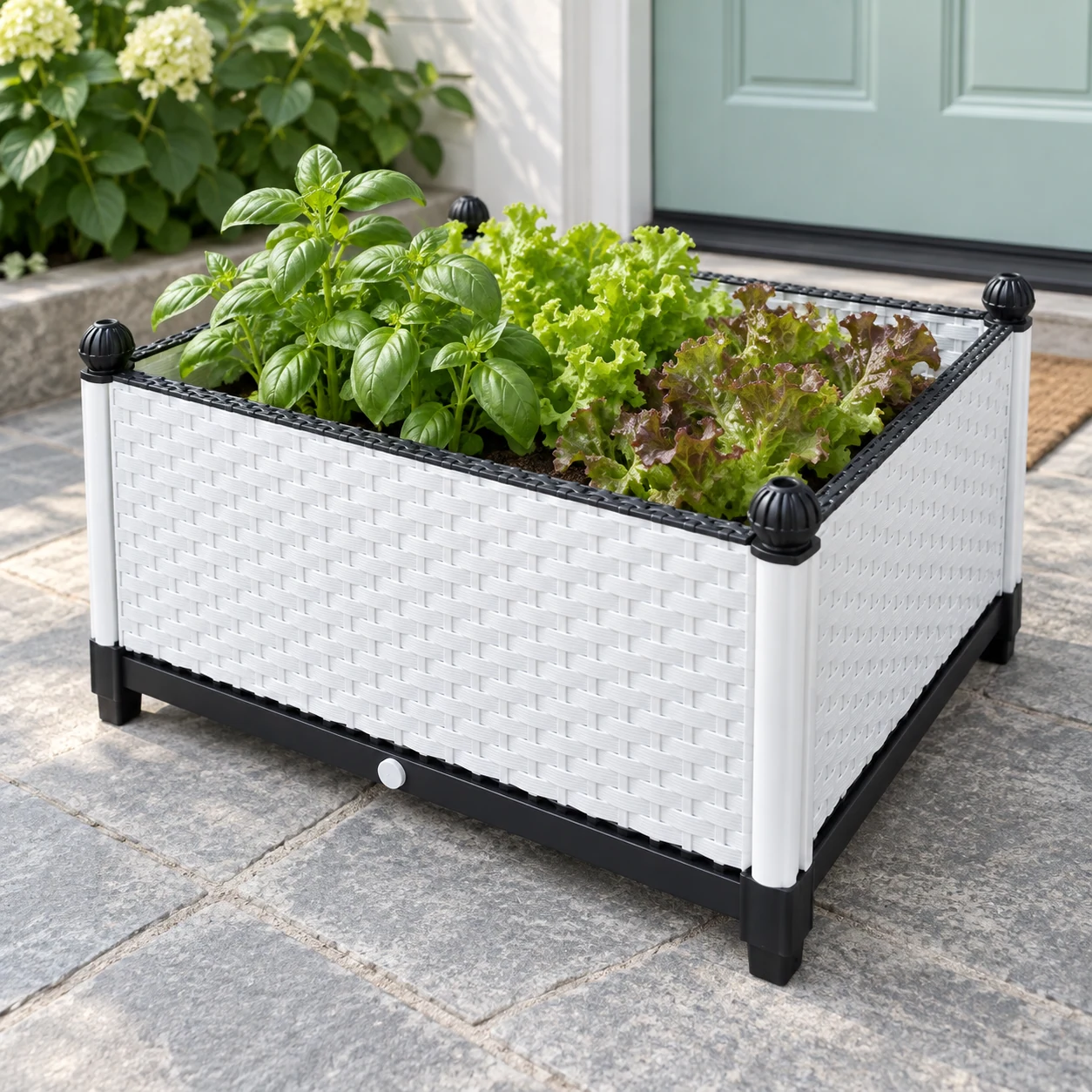 Rattan planting box in a garden setting