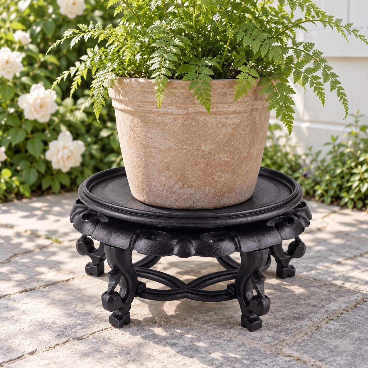 Decorative Resin Plant Stand in a garden setting